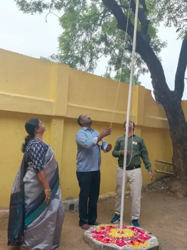 students-hoisting-national-flag