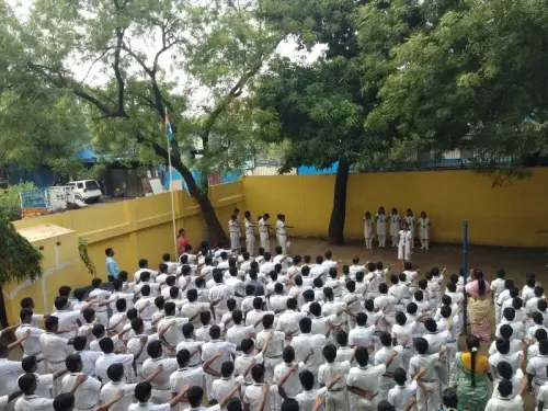 teacher-addressing-assembly